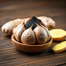 Load image into Gallery viewer, Ginger &amp; Black Garlic Infused Olive Oil